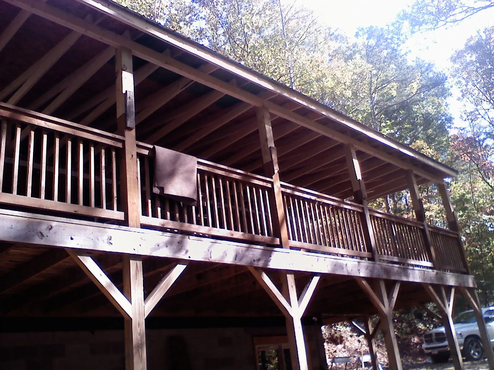 Timber framing under a new elevated porch and deck — Roof Leak Repair in Brodhead by Roofing Brothers